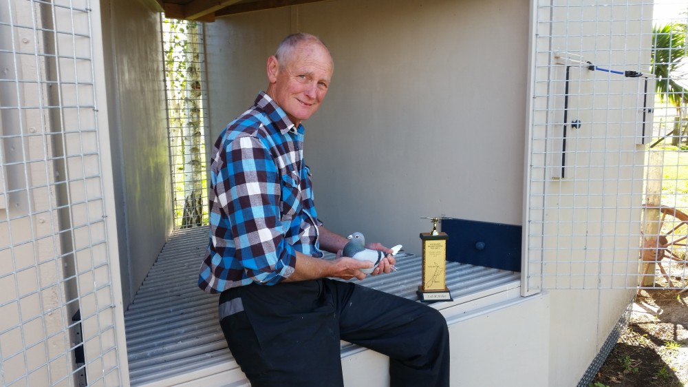 Steve Archer outside the Archer's new loft from an another angle again holding their 2013 ARPF Timaru winner. Steve likes flying the long distance. Steve and Magda will fly the 2015 Old Bird season in the Pukekohe Pigeon club, the same club as the writer. 